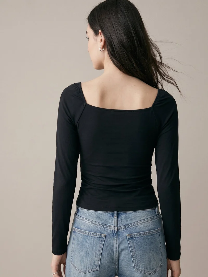 Outzidr  Black Square Studded Neck Top With Sheer Sleeves for Women | Best Price UAE