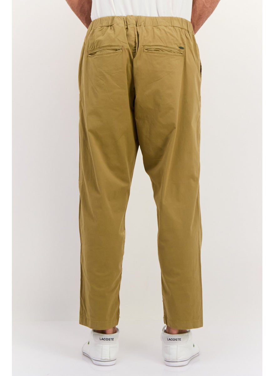 Men Regular Fit Solid Chino Pants, Khaki - pzsku/ZEE30870E861BE2065AA6Z/45/_/1737641930/194128d6-045d-441f-aaad-5081769215d4