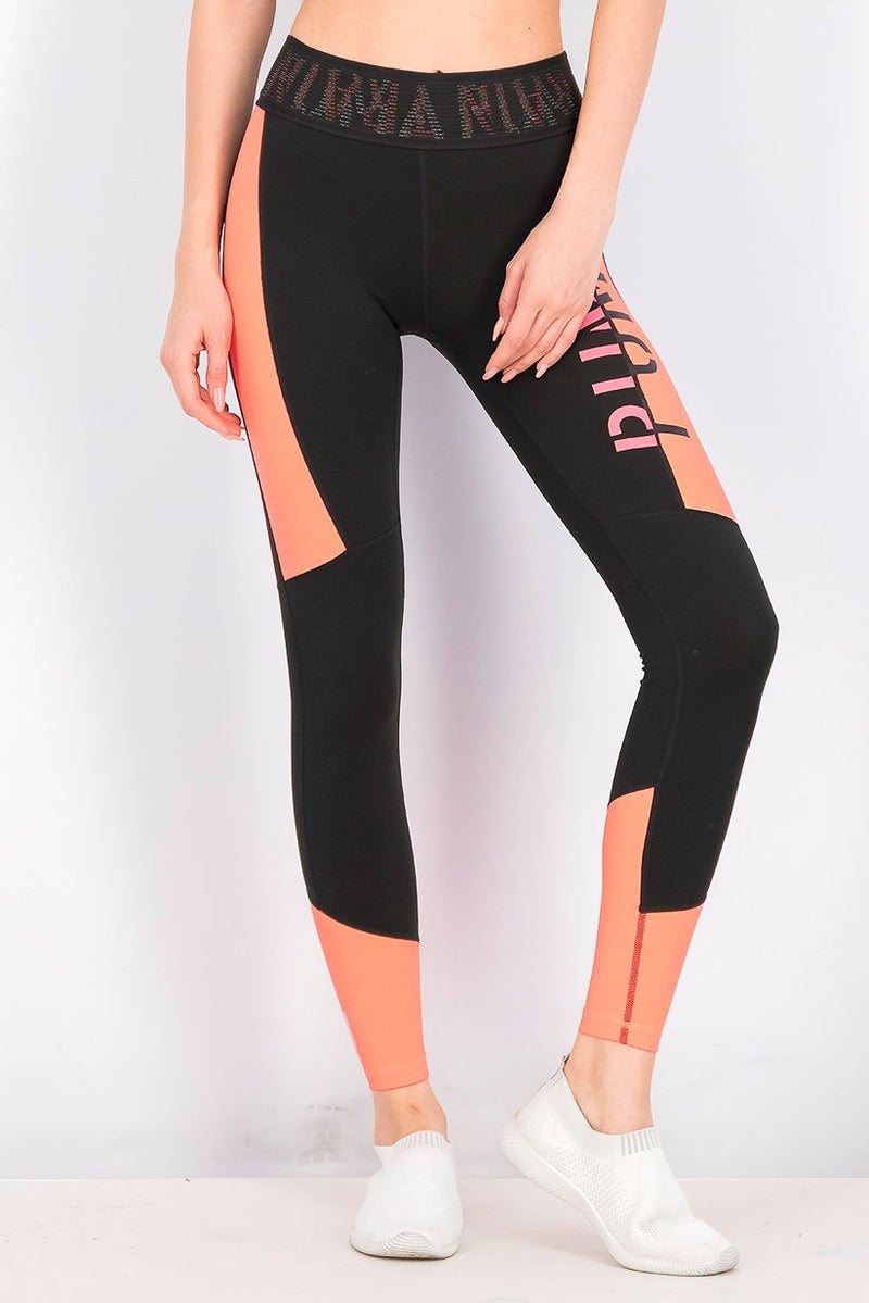 PUMA Women Logo 7 and 8 Tights, Black and Neon Pink - Image 1