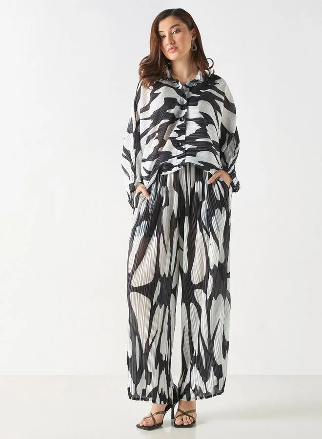 2Xtremz 2Xtremz All-Over Print Plisse Wide Leg Pants with Pockets