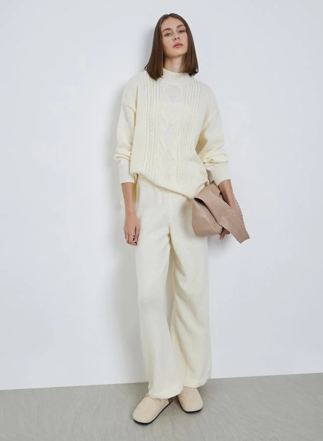 ستايلي سويتر محبوك بحياكة كابل بقصة عادية