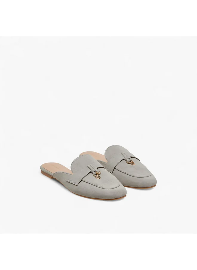 فلورا بيلا من شو إكسبرس Women Solid Slip-On Mules with Metal Accent