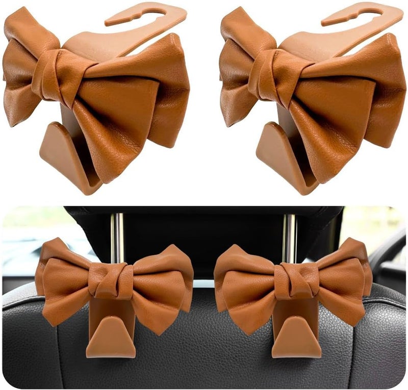 KASTWAVE 2 PCS Leather Car Seat Headrest Hooks, Cute Bow Shaped Backseat Organizer Hooks for Purses, Bags, Coats, Umbrellas, Sturdy Car Headrest Hangers Car (Brown) - Image 1