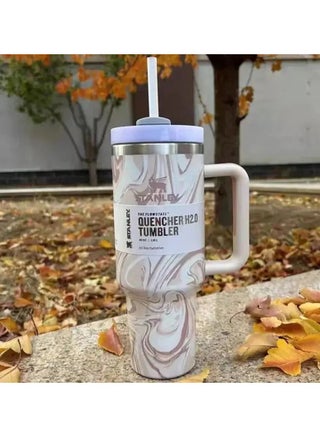 Quencher H2.0 Flowstat Vacuum Insulated Stainless Steel Tumbler with Lid and Straw for Water, Iced Tea, Coffee, Smoothies and More 1.18L Stanley Marble Beige - pzsku/ZEE4ADFBF8972119533CDZ/45/_/1740488375/68088f7c-b12e-4b3c-b5e4-4318d65f9886