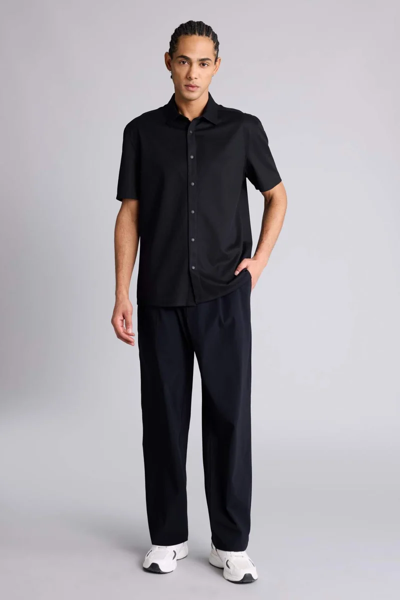 ديفاكتو Baggy Fit Trousers
