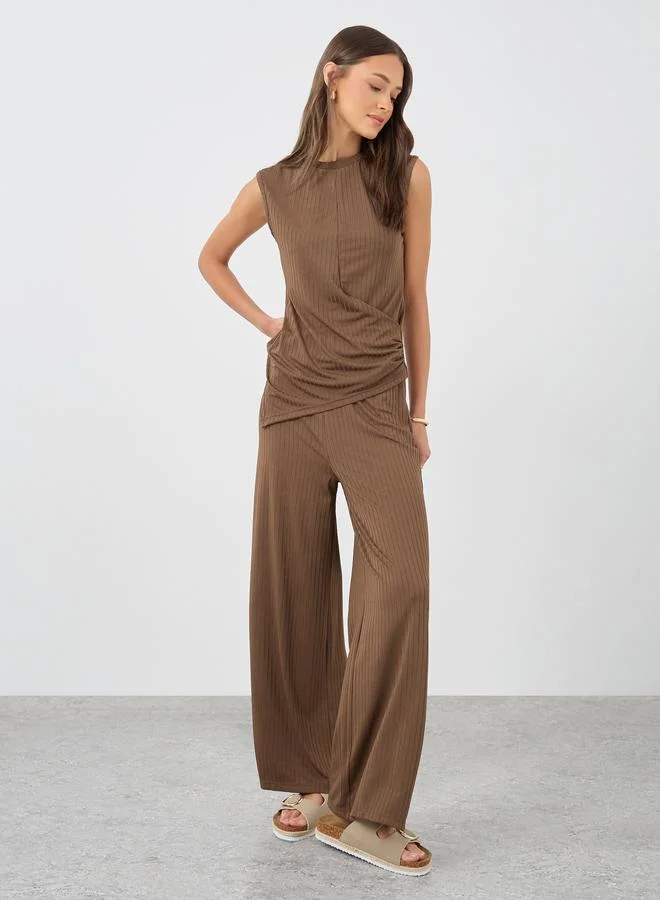 ستايلي Styli Textured Sleeveless Asymmetric Hem Top