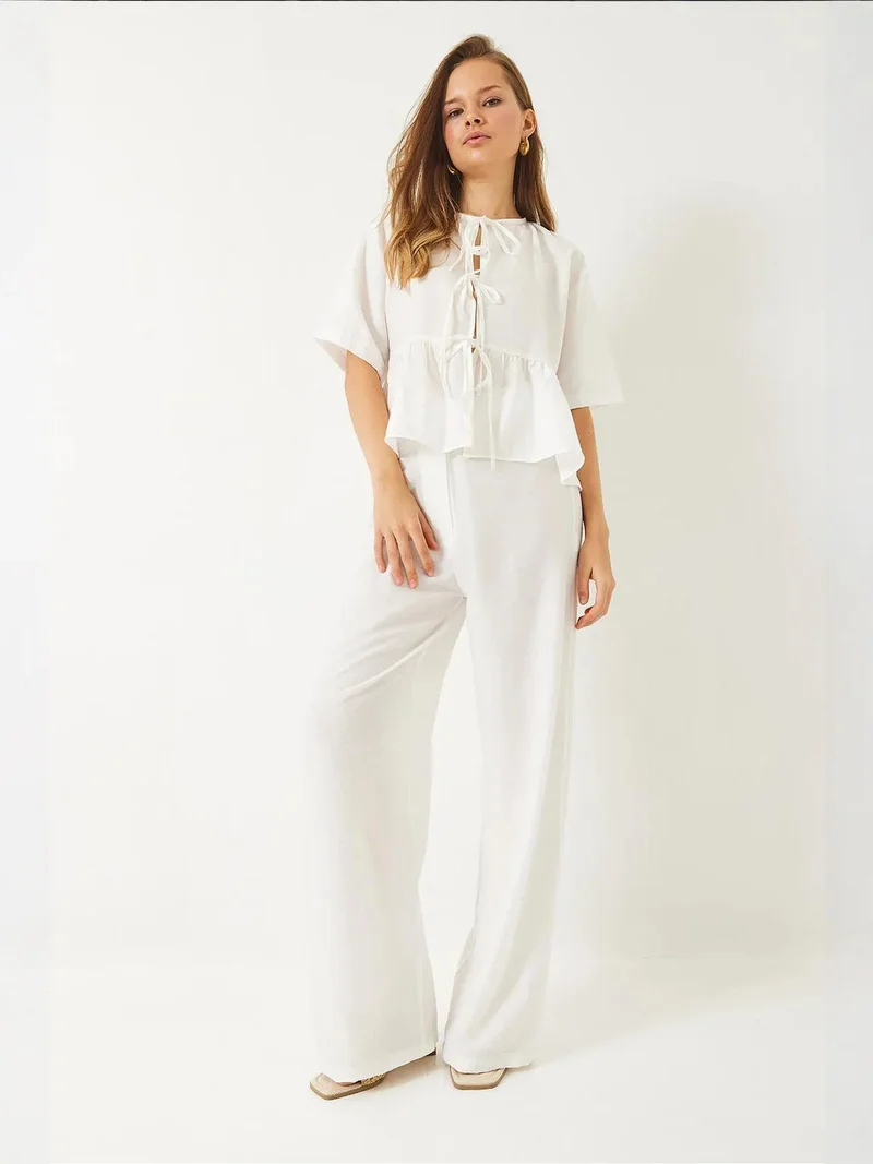 بيانكو لوتشي طقم قطعتين لوكسي بنقوش مع تفاصيل مكشكشة