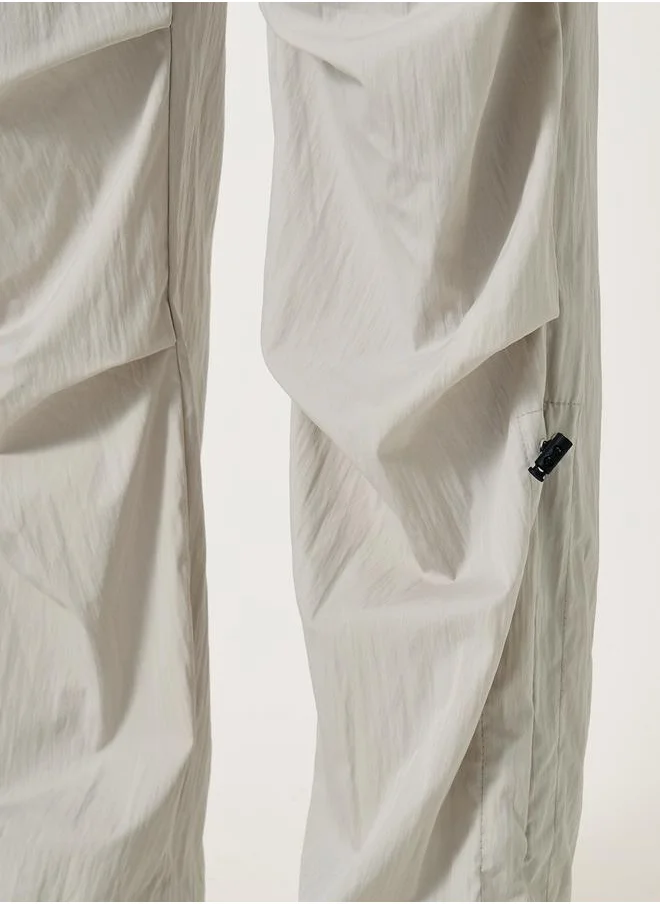 ستايلي Oversized Parachute Pants with Drawstring