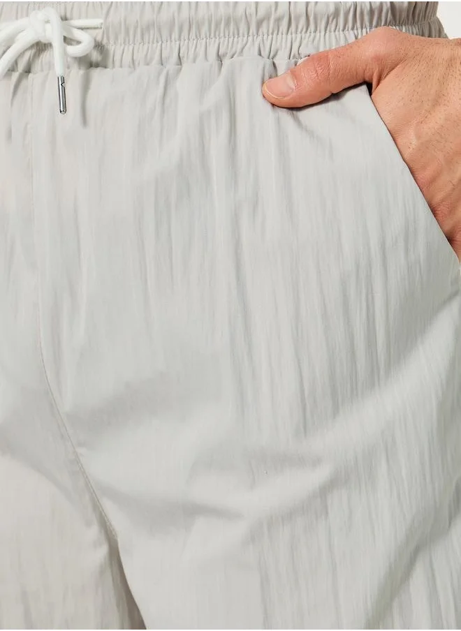 ستايلي Oversized Parachute Pants with Drawstring