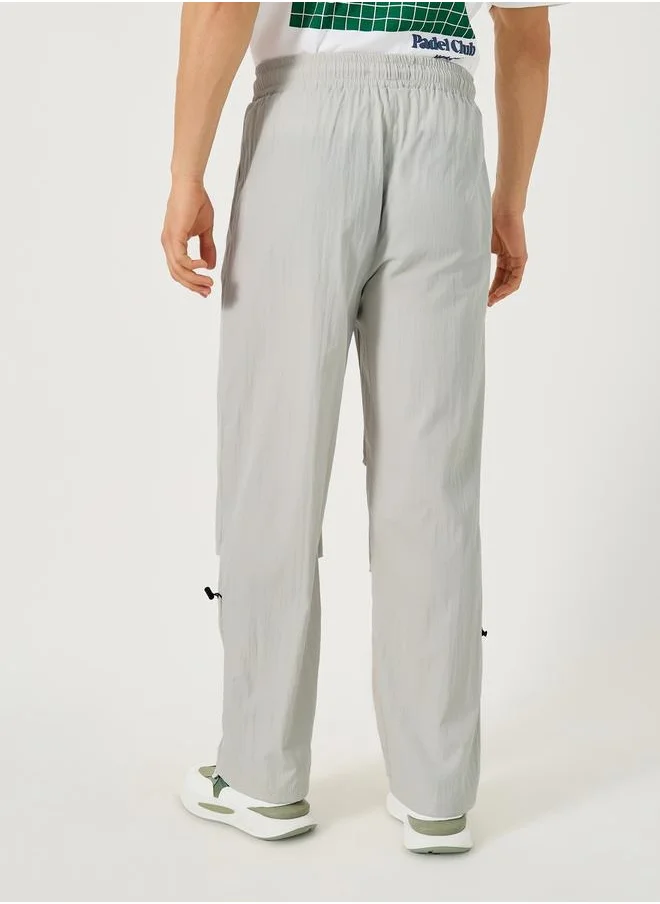 ستايلي Oversized Parachute Pants with Drawstring