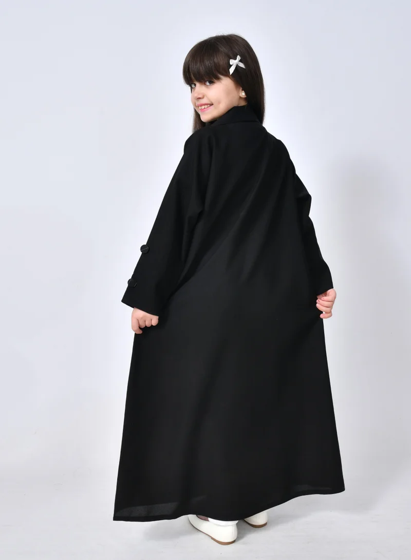 HAWRAA ABAYA Talia Abaya: Girls' formal cut with front pleats and striped fabric overlay