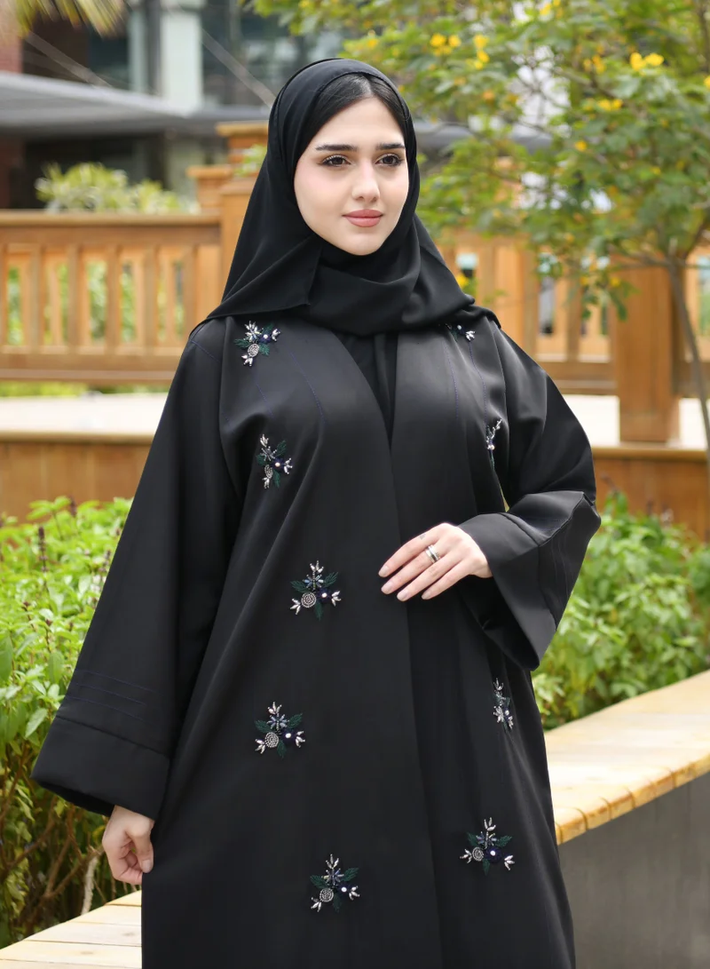 عبايات حوراء عباية لف مزينة بشك و تطريز باللون الأخضر و الأزرق و الكريستال الملون