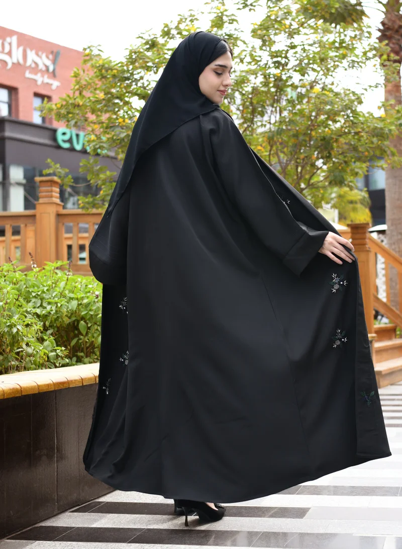 عبايات حوراء عباية لف مزينة بشك و تطريز باللون الأخضر و الأزرق و الكريستال الملون