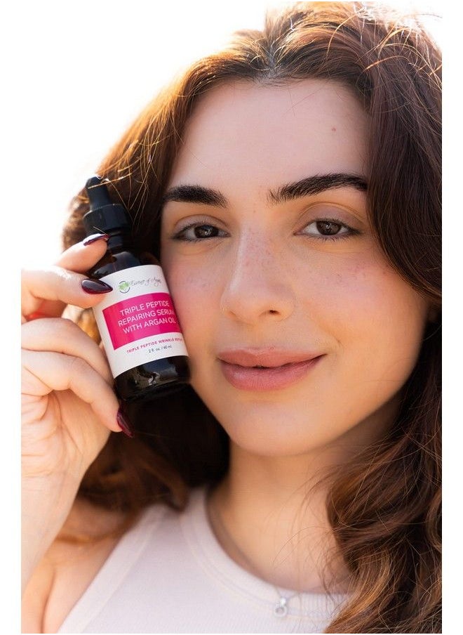 Essence Of Argan - مصل ثلاثي الببتيد للوجه مضاد للشيخوخة مع زيت الأرجان والصبار والبابونج والشاي الأخضر وزيت الزيتون لترطيب البشرة بعمق وإشراقها وإصلاح التجاعيد (2 أونصة سائلة/60 مل) - Image 1