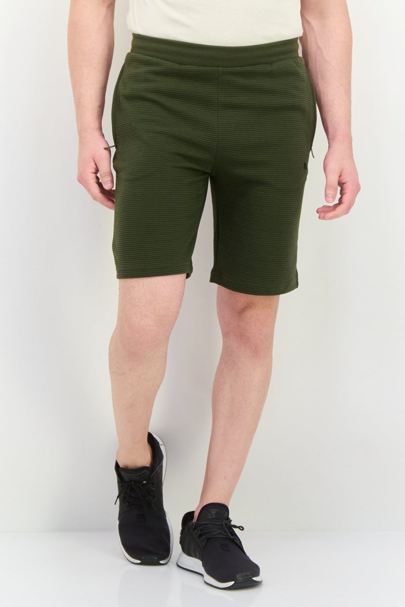 PUMA Men Sportswear FIT Outdoors Shorts, Dark Olive - Image 1