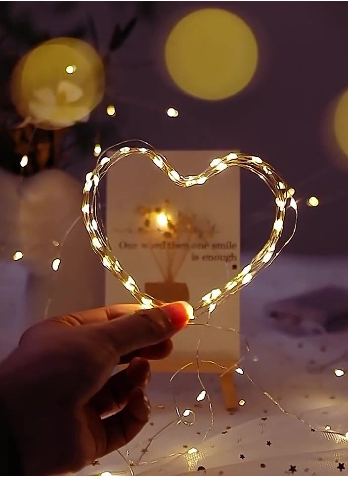 سوقورة - مصابيح LED الصفراء الدافئة سلاسل الأسلاك البيضاء الإضافات 5M 50 مصابيح LED سلاسل مصابيح LED ديكور المنزل عيد الميلاد عيد الفطر عيد الميلاد عيد الميلاد وحفلات الزفاف ديكور صناديق زر التحكم التبديل 50 LED بطارية مقاومة للماء تعمل بالطاقة الجنيسة الوميض السلسلة الأصفر (5M 16 قدم) - Image 1