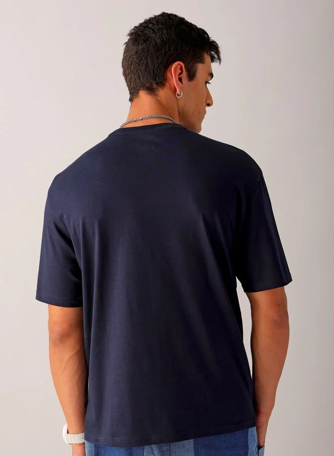 شركة المرآب الهندية Men Boxy Oversized Placement Print Round Neck Tshirt