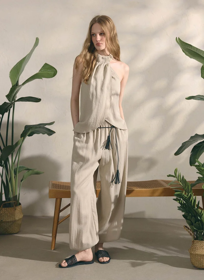 Lichi  Draped textured top with halter neck for Women | Best Price UAE