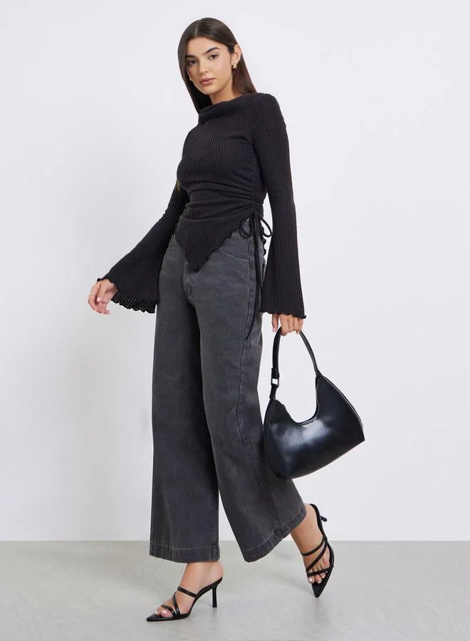 ستايلي بلوزة أسود مضلع بأكمام طويلة مع رباط جانبي