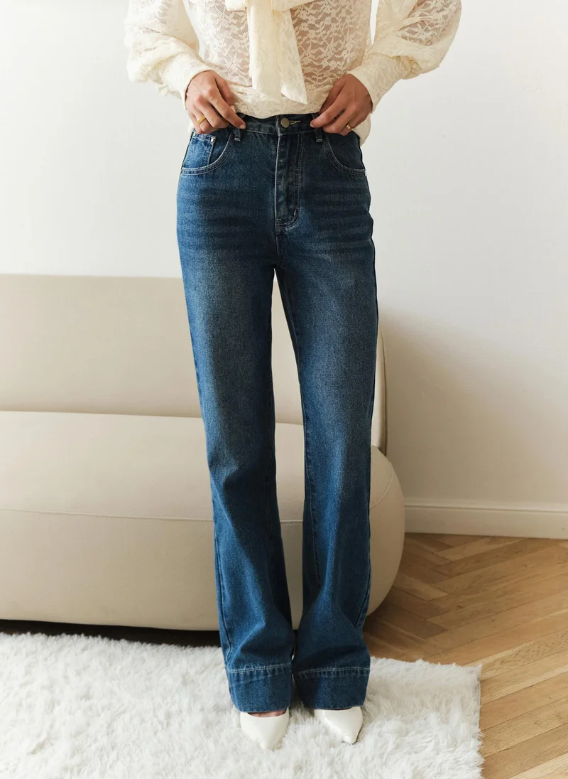 Straight jeans with scuffs