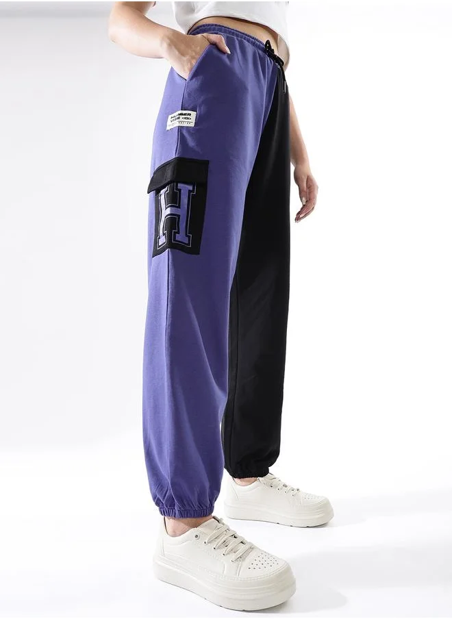 هوبرهولمي Women Track Pants in Multicolor featuring Jogger fit with a colourblocked pattern, no sleeves, regular length, secured with elasicated + drawstring closure, crafted from terry – designed to make a statement wherever you go.