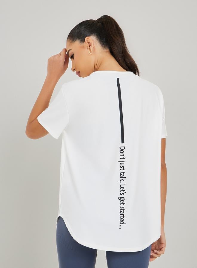 Styli Center Back Minimal Slogan In Line To Stripe Loose Yoga Top  - Image 4