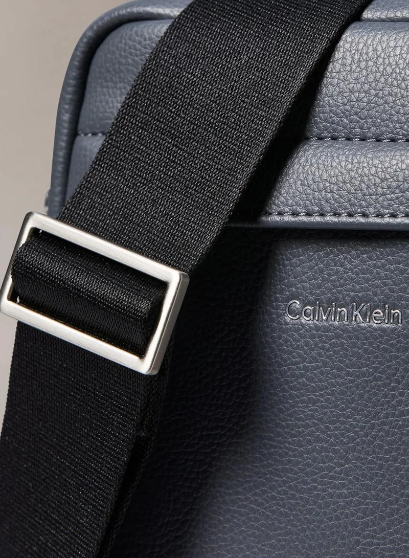Calvin Klein  Micro Pebble Reporter Bag for Men | Best Price UAE