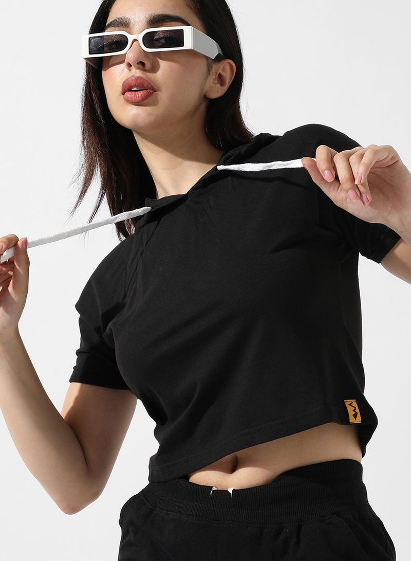 Campus Sutra Campus Sutra Women's Solid Black Hooded Cropped Top For Casual Wear | Crew Neck | Short Sleeve | Poly Cotton Top Crafted With Regular Sleeve & Comfort Fit For Everyday Wear  - Image 1