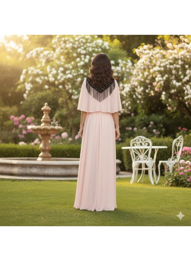 FULL JOY An elegant long dress in a light, flowing fabric with a distinctive collar and a touch of luxurious fringe. - Image 2