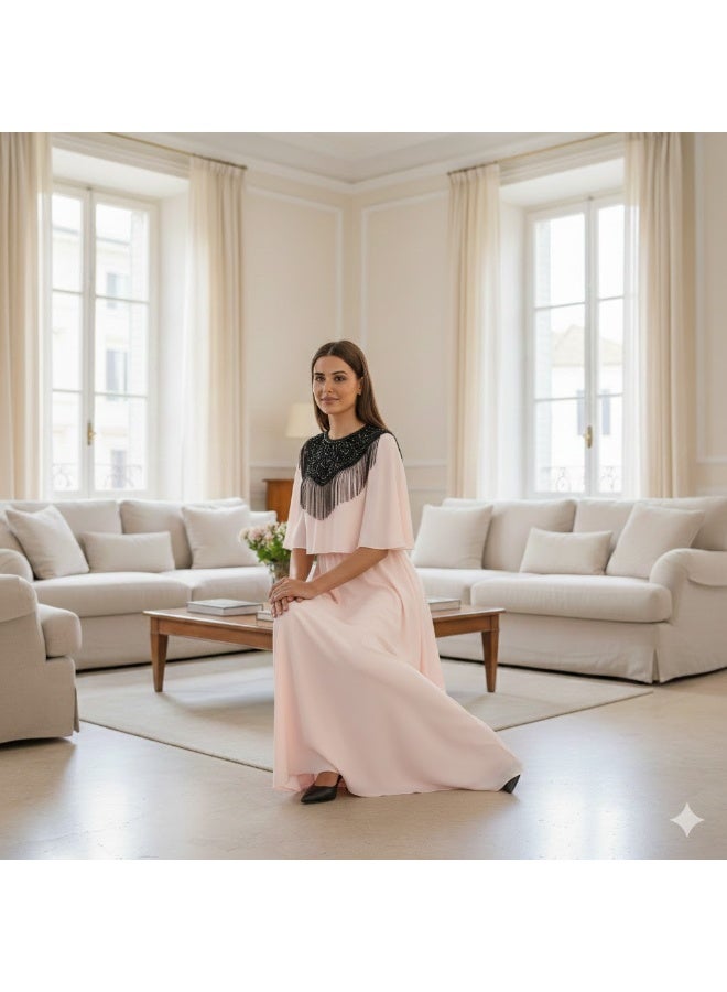 FULL JOY An elegant long dress in a light, flowing fabric with a distinctive collar and a touch of luxurious fringe. - Image 4