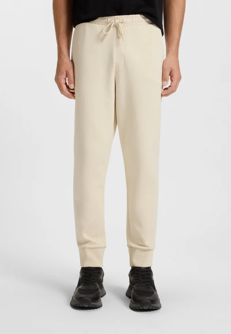 BOSS Stretch-cotton tracksuit bottoms with logo print