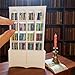 M.Zibos Mini Bookshelf for Anxiety Relief 112 Scale Vintage Bookcase with 4 Drawers 100 Mini Books Dollhouse Desktop DecorWhite - Image 4