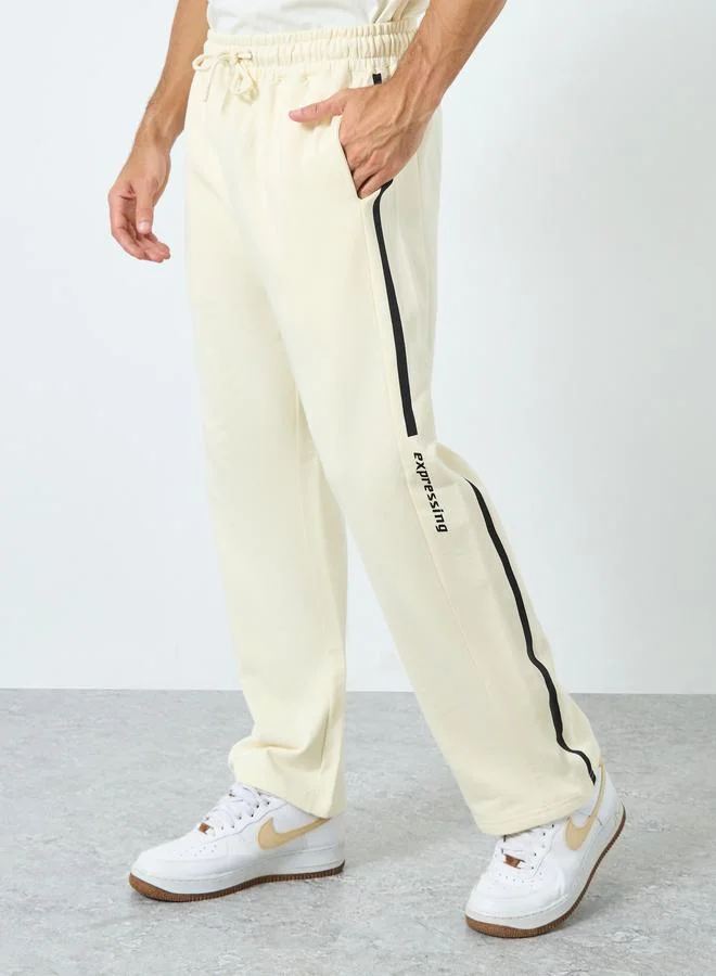 ستايلي Styli Men Cream Striped Panel Fleece Joggers