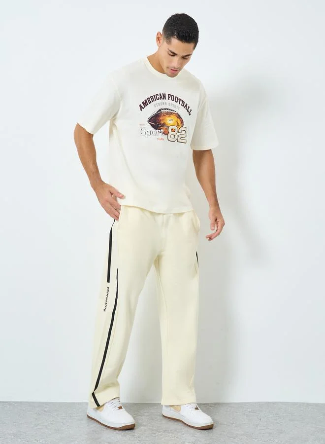 ستايلي Styli Men Cream Striped Panel Fleece Joggers