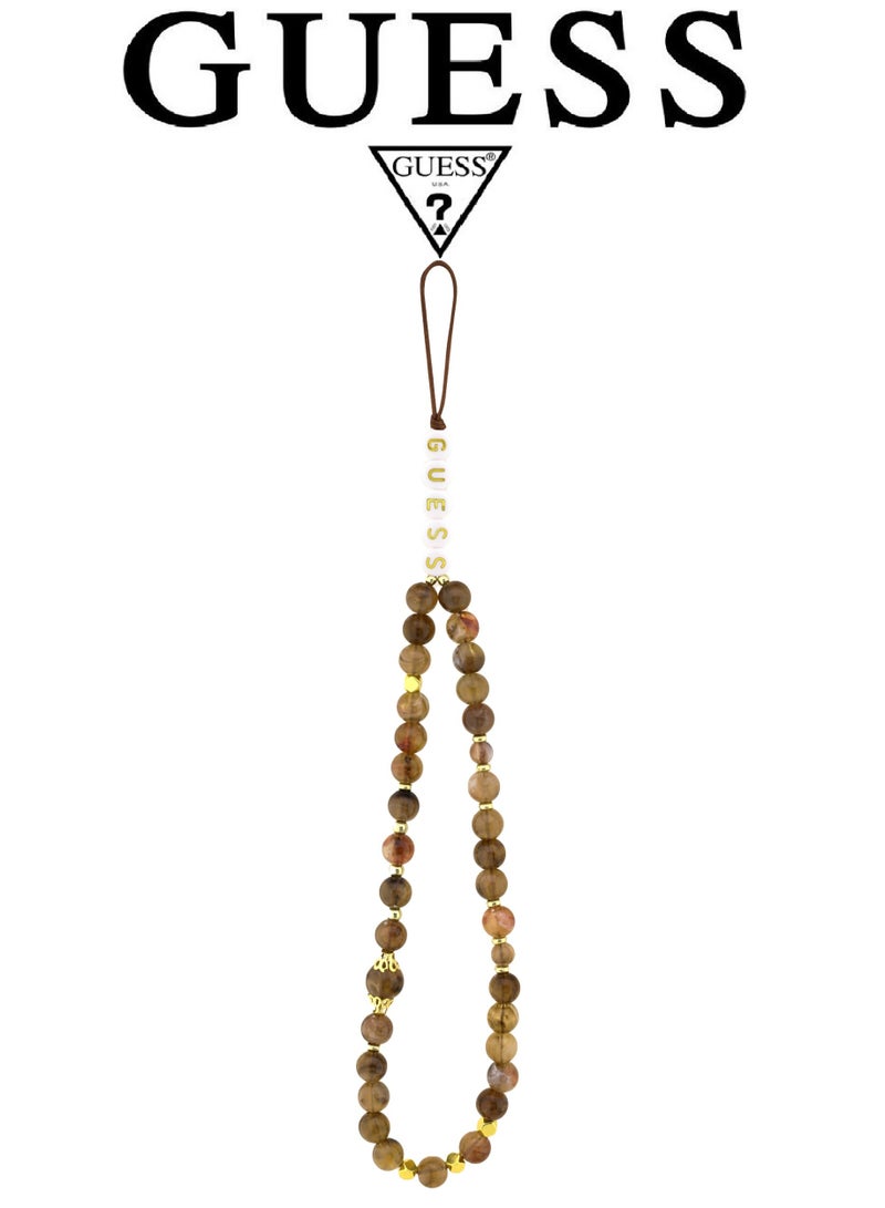 CG MOBILE Luxury embossed leather iPhone 17 Pro case with bracelet. MagSafe wireless charging iPhone cover iphone 17 pro. Shockproof, durable back protection iphone 17 pro max back cover. French-designed, elegant iphone 17 pro cover, certified in partnership with GUESS and CG MOBILE. Brown phone case. - Image 3