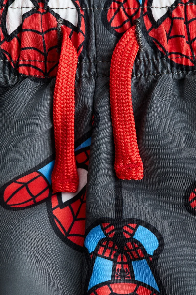 اتش اند ام شورت سباحة مزين برسمة