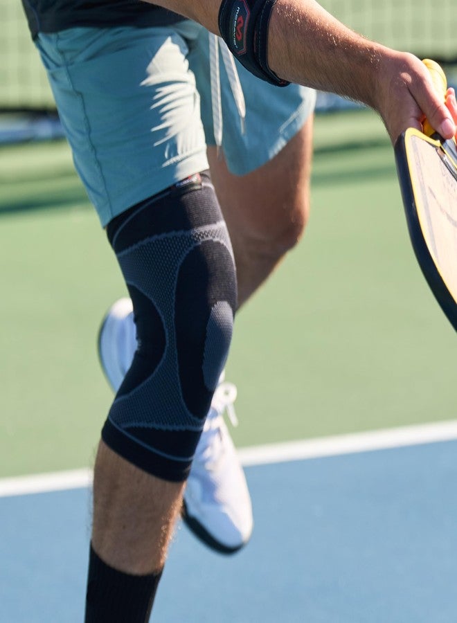 ماكديفيد كم الركبة McDavid MD5125-01 المصنوع من النايلون والمرن في أربعة اتجاهات مع دعامة جل، مقاس صغير للبالغين (أسود) - Image 2