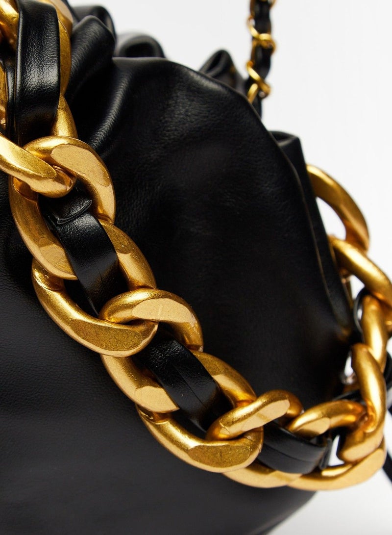 Solid Crossbody Bag with Chain Accented Strap and Drawstring Closure
