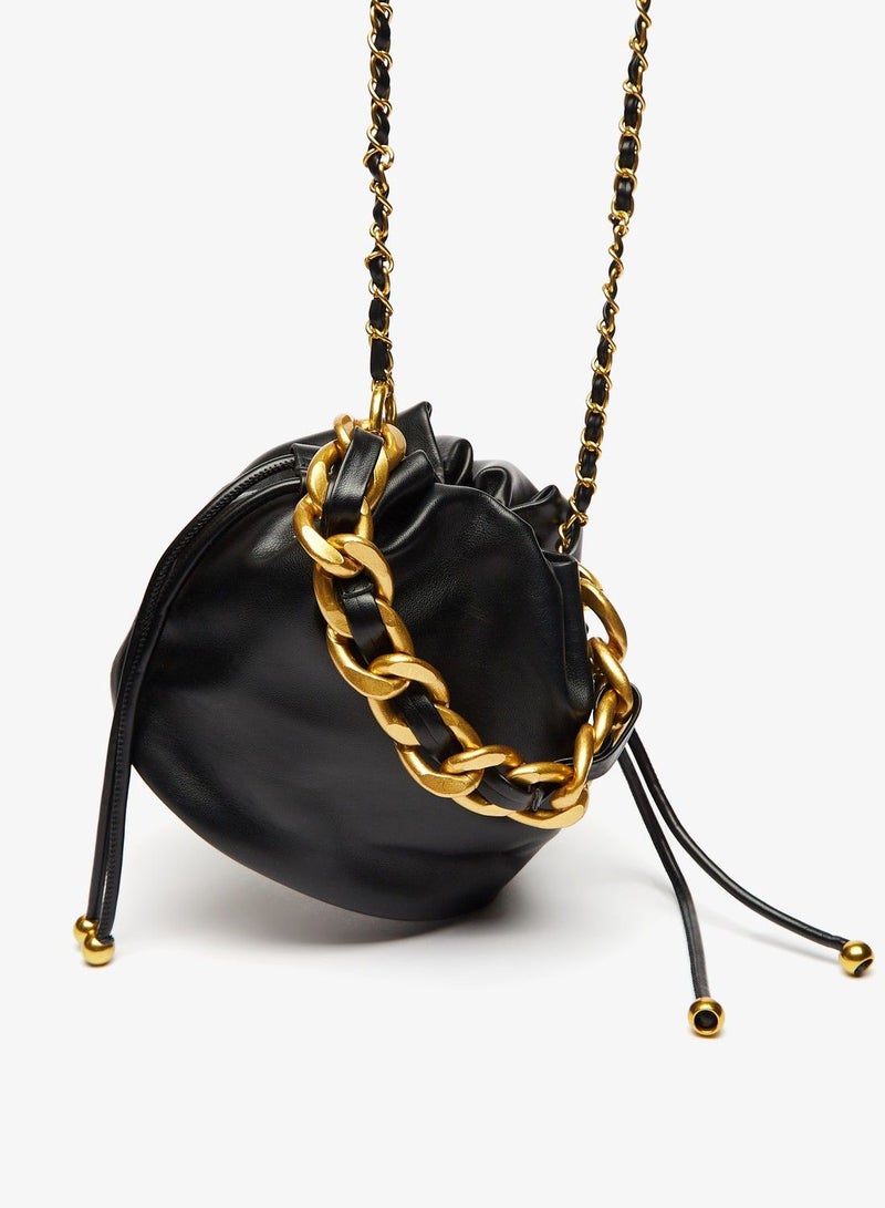 Solid Crossbody Bag with Chain Accented Strap and Drawstring Closure