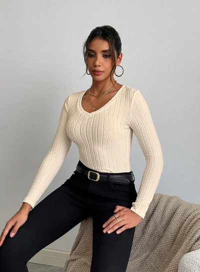 تايك تو بلوزة محبوكة بتفاصيل مضلعة وأكمام طويلة