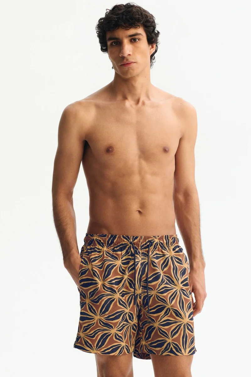 Patterned swim shorts