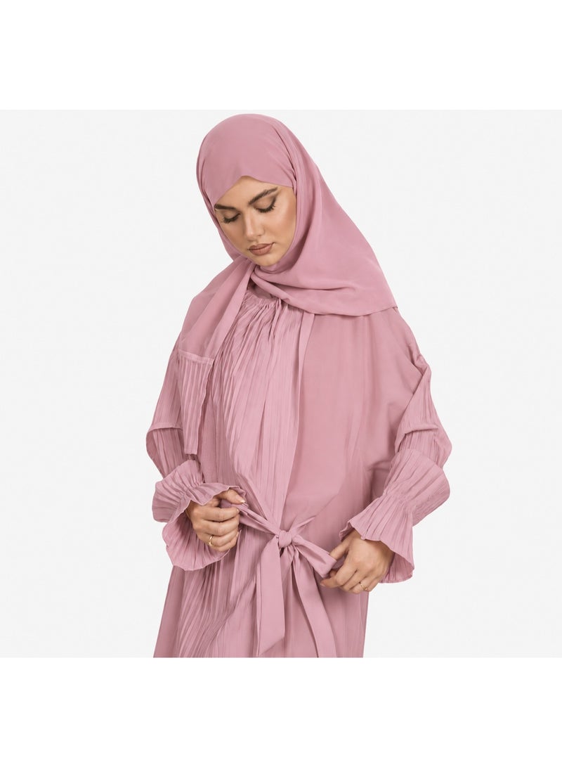 Women's prayer garment featuring an open front with a tie closure and a loose, comfortable fit; designed with soft, pleated sleeves and made from lightweight fabric suitable for prayer, Umrah, Hajj, and daily use.