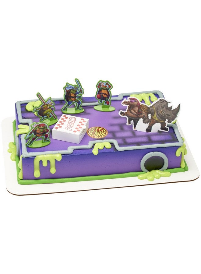 DecoPac ديكوست® قناديل السلاحف النينجا المتحولة™ زينة كعكة قوة البيتزا، 6 قطع زينة كعكة مع تماثيل السلاحف، عود كعكة، ومقذوف البيتزا ! | لعيد الميلاد، الحفلات، الاحتفالات - Image 1