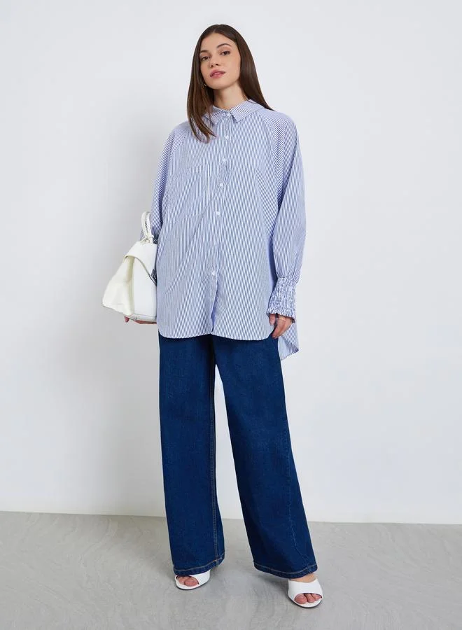 ستايلي بلوزة مخططة بقصة واسعة