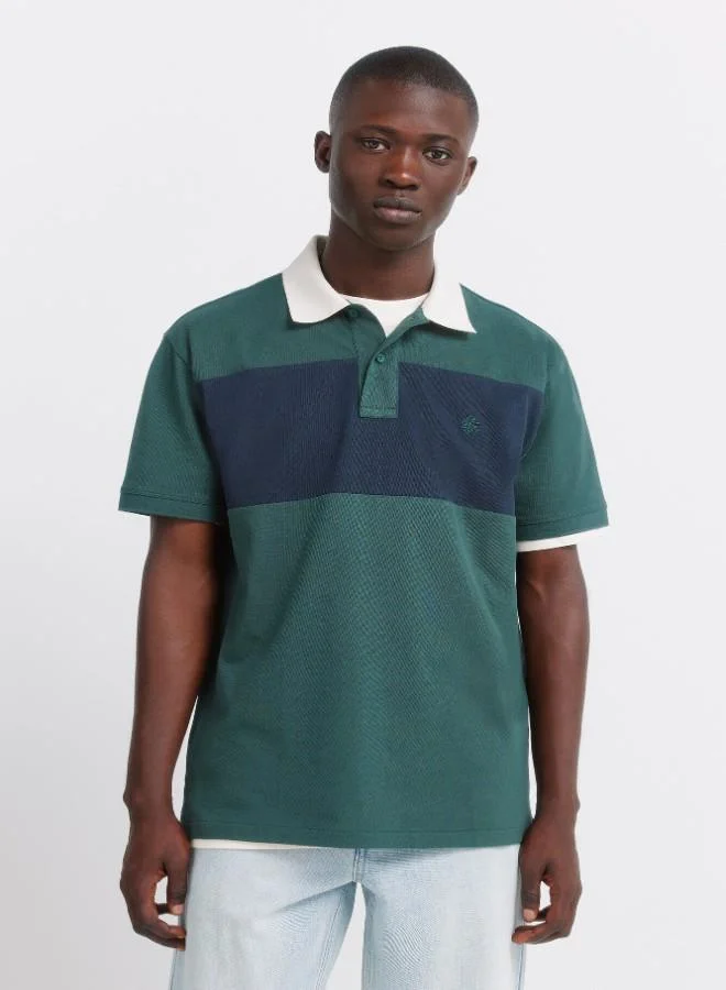 Springfield 100% cotton piqué regular fit polo shirt. Contrast ribbed polo collar. Contrast embroidered Springfield logo.