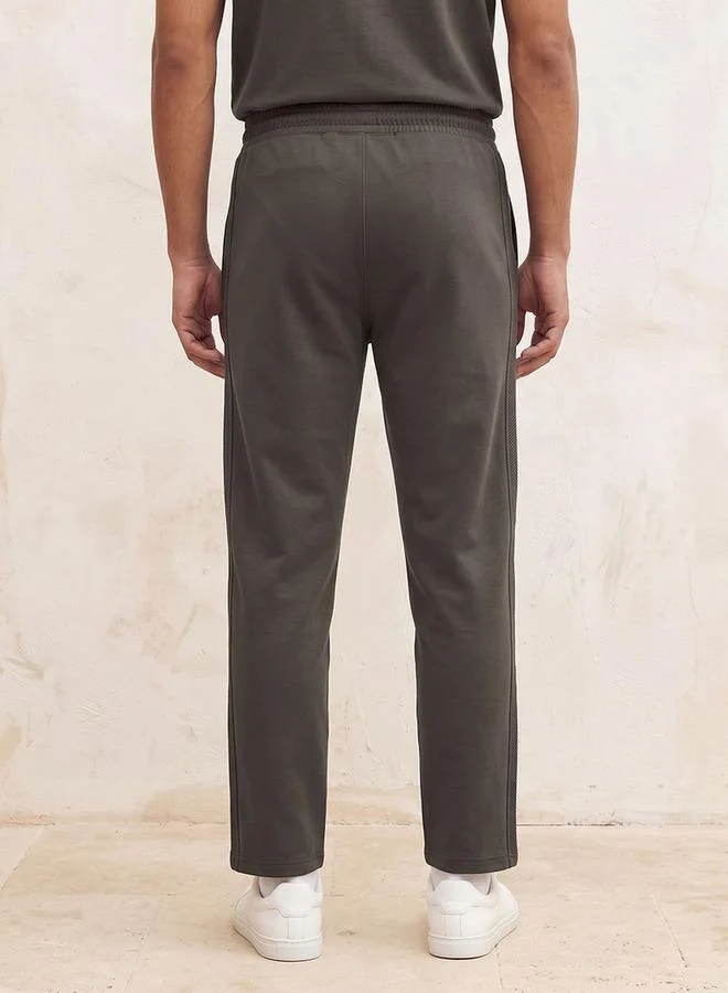 Kappa Grey Kappa 2-Way Stretch Tape Detail Joggers for Men | Best Price UAE
