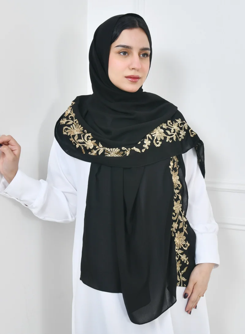 HAWRAA ABAYA Black linen veil with floral embroidery with golden threads