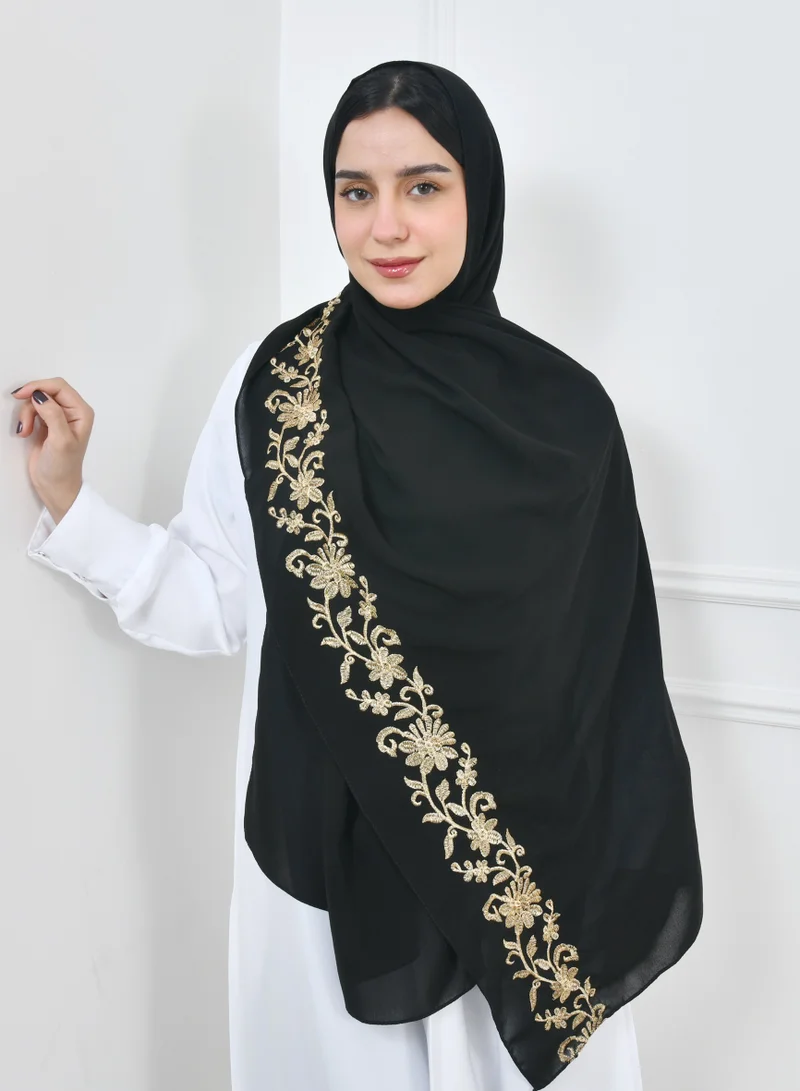 HAWRAA ABAYA Black linen veil with floral embroidery with golden threads