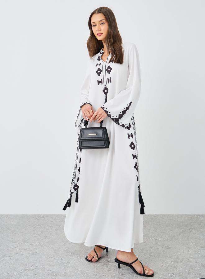 جلابية مطبوعة بشراشيب ستايلي – أناقة مسائية بإطلال...