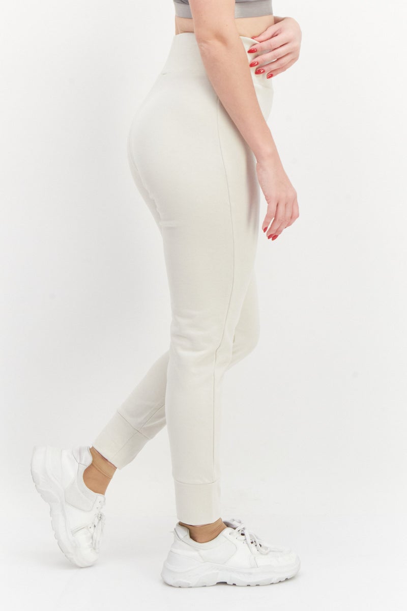 NA-KD Women Solid Basic Tapered Pull On Jogger Pants, Light Beige - Image 3